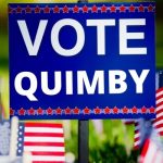 political yard sign with flags